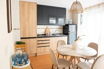 Una cocina o zona de cocina en Apartamentos Eras Centro
