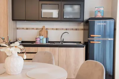 Una cocina o zona de cocina en Apartamentos Eras Centro