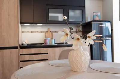 Una cocina o zona de cocina en Apartamentos Eras Centro