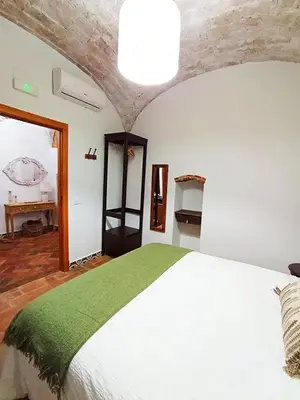 Cama o camas de una habitación en La Calderera