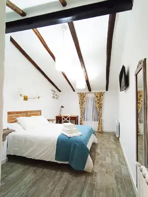 Cama o camas de una habitación en La Calderera