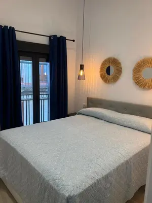 Cama o camas de una habitación en La casita de la plaza