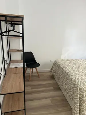 Cama o camas de una habitación en La casita de la plaza