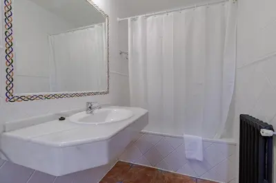 Un baño de HOTEL Ávila Centro