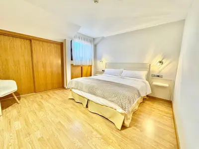 Cama o camas de una habitación en Hotel Ávila Diró
