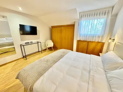 Cama o camas de una habitación en Hotel Ávila Diró