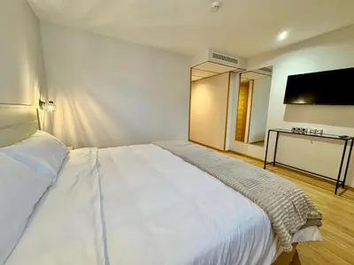 Cama o camas de una habitación en Hotel Ávila Diró