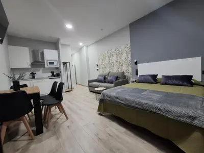 Cama o camas de una habitación en Medea Suites Apartamentos