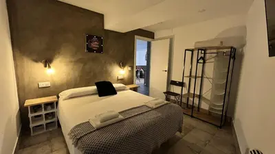 Cama o camas de una habitación en Ohana Raiz Casa con Patio Parking Gratuito y Exclusivo