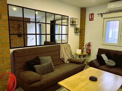Zona de estar de Ohana Raiz Casa con Patio Parking Gratuito y Exclusivo