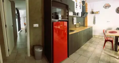 Una cocina o zona de cocina en Ohana Raiz Casa con Patio Parking Gratuito y Exclusivo