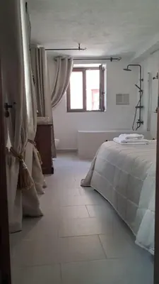 Cama o camas de una habitación en Casa Ypsilon Olive Oil