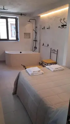 Cama o camas de una habitación en Casa Ypsilon Olive Oil