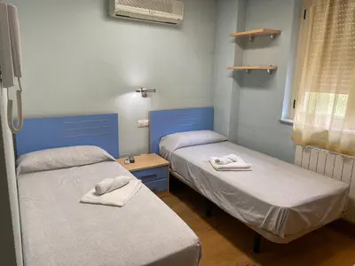 Cama o camas de una habitación en REMANAL Residencia