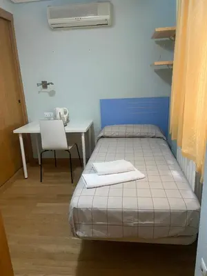 Cama o camas de una habitación en REMANAL Residencia