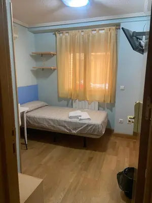 Cama o camas de una habitación en REMANAL Residencia