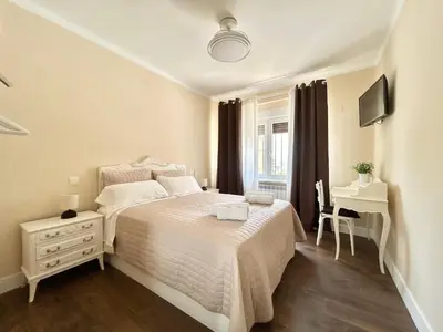 Cama o camas de una habitación en el piso del patio chico