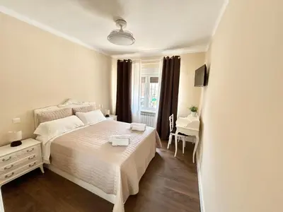 Cama o camas de una habitación en el piso del patio chico
