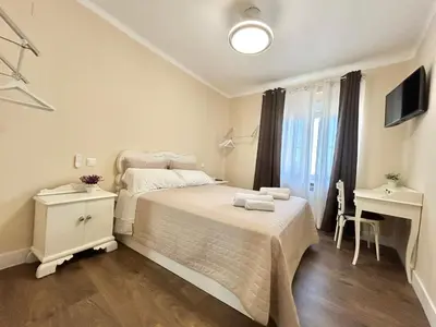 Cama o camas de una habitación en el piso del patio chico
