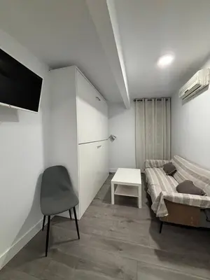 Cama o camas de una habitación en Hostal Los Rosales