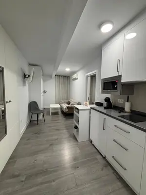 Una cocina o zona de cocina en Hostal Los Rosales