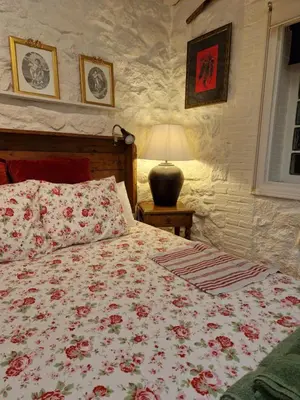 Cama o camas de una habitación en El Atalanto