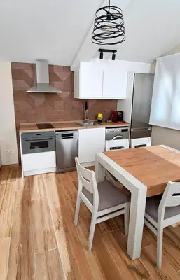Una cocina o zona de cocina en Apartamento La Monina CUEVAS DEL VALLE