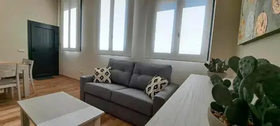 Zona de estar de Apartamento La Monina CUEVAS DEL VALLE