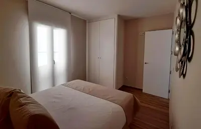 Cama o camas de una habitación en Apartamento La Monina CUEVAS DEL VALLE