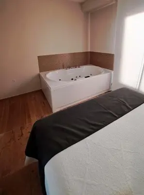Cama o camas de una habitación en Apartamento La Monina CUEVAS DEL VALLE