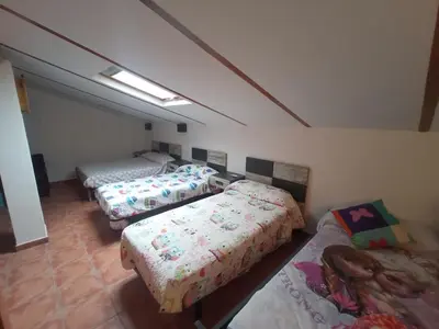 Cama o camas de una habitación en Casa rural Labrador