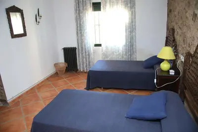 Cama o camas de una habitación en Casa Rural Arroyo de los Álamos