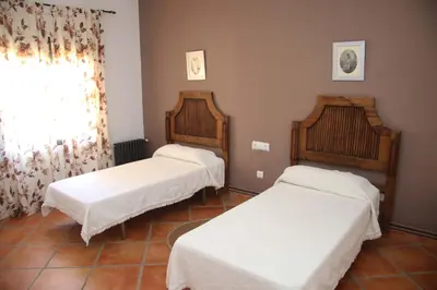 Cama o camas de una habitación en Casa Rural Arroyo de los Álamos