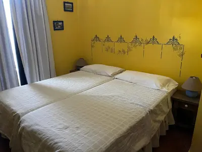 Cama o camas de una habitación en LAS CUATRO CALLES Bis