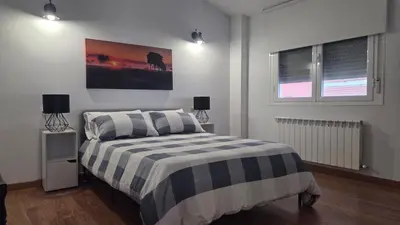 Cama o camas de una habitación en Ático Vista La Sierra