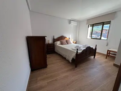 Cama o camas de una habitación en El Mirador de Cabezuela, apartamento con vistas al Valle del Jerte