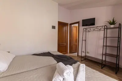 Cama o camas de una habitación en Hostal La Balsá