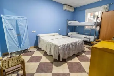 Cama o camas de una habitación en AlbergueRojoPlata
