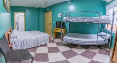 Cama o camas de una habitación en AlbergueRojoPlata
