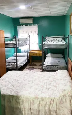 Cama o camas de una habitación en AlbergueRojoPlata