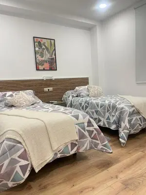 Cama o camas de una habitación en Hostal Jimena restaurante el Porvenir