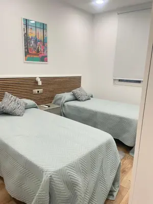 Cama o camas de una habitación en Hostal Jimena restaurante el Porvenir