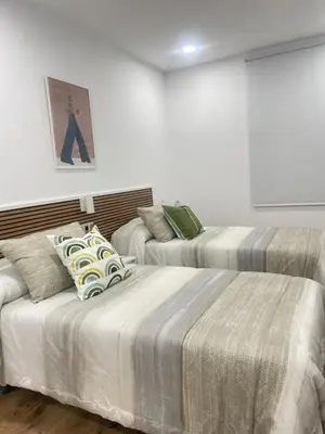 Cama o camas de una habitación en Hostal Jimena restaurante el Porvenir