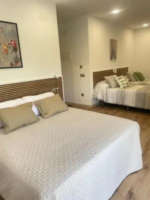 Cama o camas de una habitación en Hostal Jimena restaurante el Porvenir