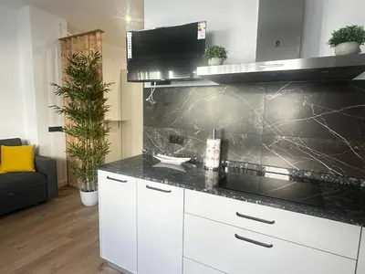Una cocina o zona de cocina en Apartamentos Alimarc Urban