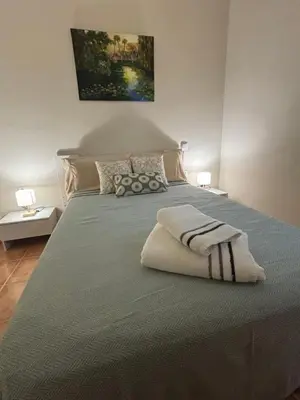 Cama o camas de una habitación en Neris Home