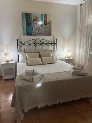 Cama o camas de una habitación en Neris Home