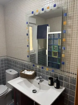 Un baño de Neris Home