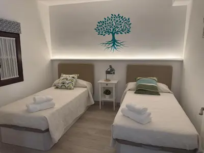 Cama o camas de una habitación en La casa de las especias