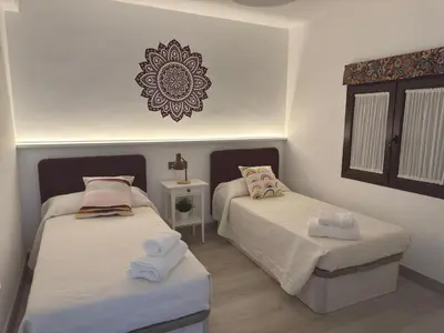 Cama o camas de una habitación en La casa de las especias